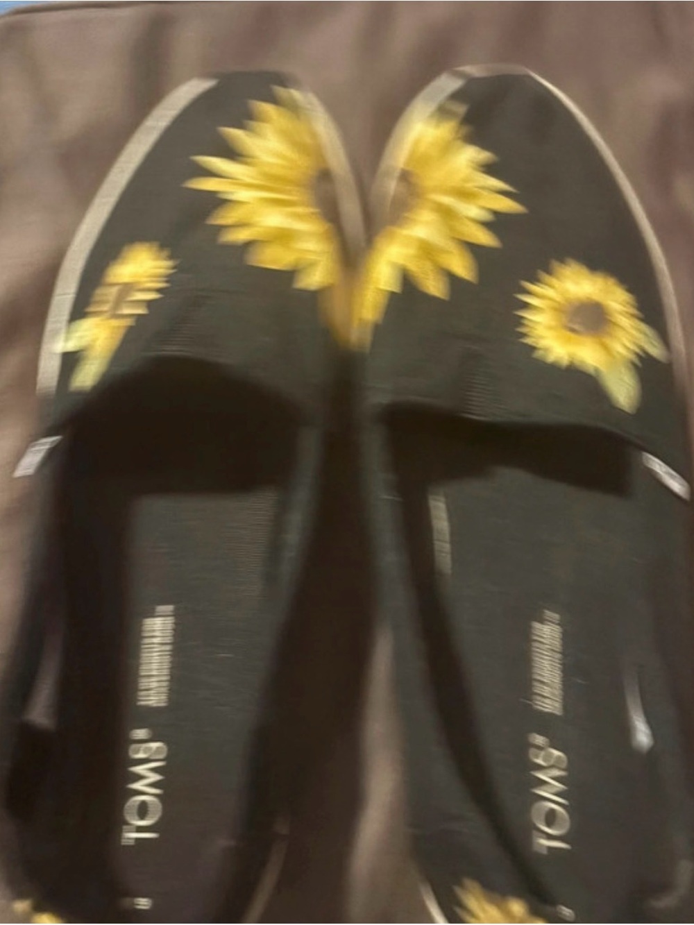 TOMS Black Slip-On Moccasins with Yellow Sunflower Design